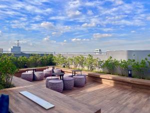 Et opholdsområde på Liberdade - Conforto e segurança com Ar e Rooftop