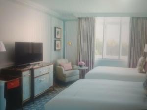 Katil atau katil-katil dalam bilik di Hotel Abhishek