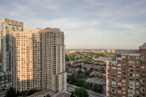 an aerial view of a city with tall buildings at Elegant 2BR 2BA Condo Heart of Mississauga SQ1 in Mississauga