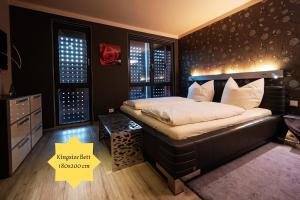 Postel nebo postele na pokoji v ubytování Stietz-Villa