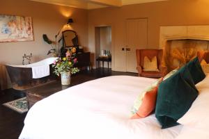 Ένα ή περισσότερα κρεβάτια σε δωμάτιο στο Sand Manor +42 φωτογραφίες