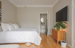 Ένα ή περισσότερα κρεβάτια σε δωμάτιο στο Top spot in heart of City Center - Next to everything