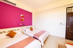 Postel nebo postele na pokoji v ubytování Zill Homestay
