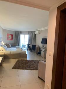 Ένα ή περισσότερα κρεβάτια σε δωμάτιο στο President Hotel