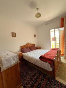 Ένα ή περισσότερα κρεβάτια σε δωμάτιο στο Calm and cozy stay