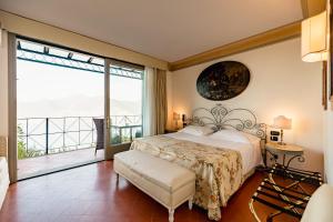 Postel nebo postele na pokoji v ubytování Relais I Due Roccoli + 59 fotografií