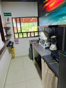 Un televizor și/sau centru de divertisment la Cabaña Selvatica-completa
