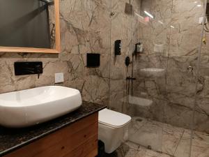 Koupelna v ubytování Heryk Hillview Hotel + 95 fotografií