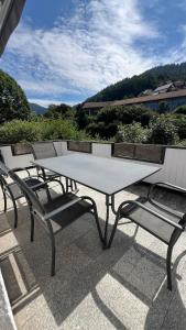 a table and chairs sitting on a patio at Bachnixe 1 in Seebach