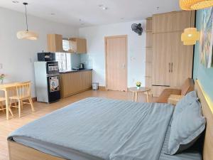 Η κουζίνα ή μικρή κουζίνα στο Reveur Apartment +57 φωτογραφίες