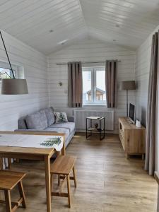 Μια τηλεόραση ή/και κέντρο ψυχαγωγίας στο Ferienhaus Schindler