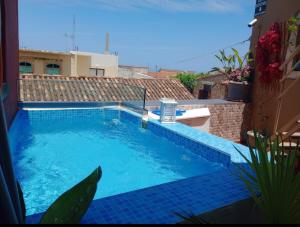 a swimming pool in the middle of a building at H&M Prive HOME MÀRGARITES RETHYMNO 115sqm in Margarítai