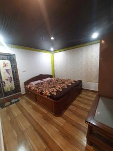 Postel nebo postele na pokoji v ubytování Agarwal Home Stay