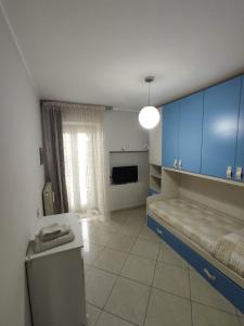 TV a/nebo společenská místnost v ubytování HH IMPERO Locazione Turistica