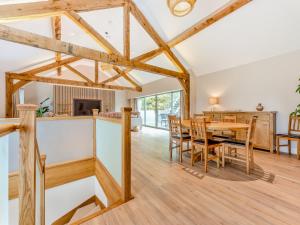 a dining room and living room with a table and chairs at Property 4 - Uk44924 in Wroxall