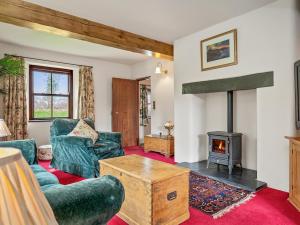 a living room with a couch and a fireplace at Worthy House in Saint Florence +28 photos