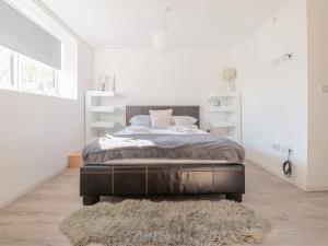 En eller flere senge i et værelse på Fantasia - Uk46009