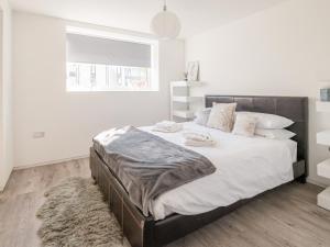 En eller flere senge i et værelse på Fantasia - Uk46009