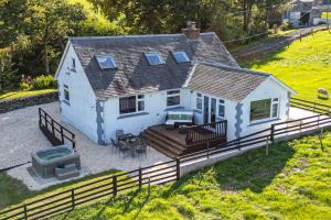 an aerial view of a house with a deck at Satchells Cottage in Melrose