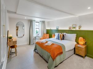 Giường trong phòng chung tại Family Retreat +19 ảnh