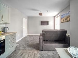 Kuchyň nebo kuchyňský kout v ubytování Apartment 4 The Dunes - Uk31824