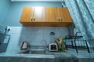 Fotografie z fotogalerie ubytování DREAMS 1BR APARTMENT 55 HD LED TV with NETFLIX v destinaci Kampala