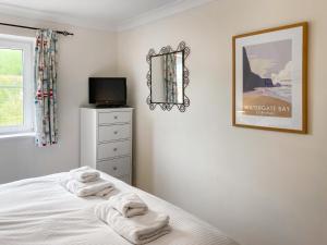 Ένα ή περισσότερα κρεβάτια σε δωμάτιο στο Apartment 20 Waves