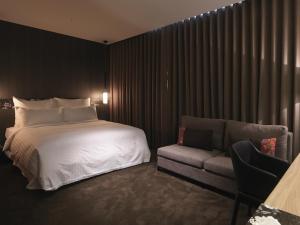 Postel nebo postele na pokoji v ubytování Hotel Dùa