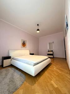 Postel nebo postele na pokoji v ubytování Kyiv 3D Kruglik Apartment + 8 fotografií