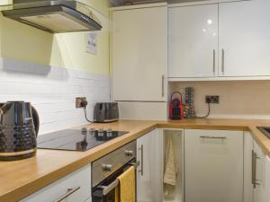 Kuchyň nebo kuchyňský kout v ubytování Wellington Place