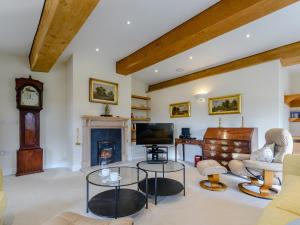 O zonă de relaxare la Coach House Cottage