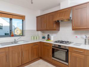 Η κουζίνα ή μικρή κουζίνα στο 3 Waterwheel Apartment +15 φωτογραφίες