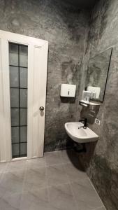 Koupelna v ubytování Aura Hostel