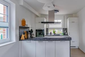 Kuchyň nebo kuchyňský kout v ubytování Piratenlager Seeblick