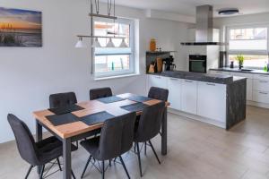 Kuchyň nebo kuchyňský kout v ubytování Piratenlager Seeblick