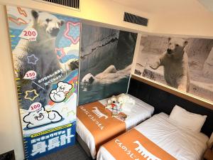 Postel nebo postele na pokoji v ubytování Henn na Hotel Osaka Namba