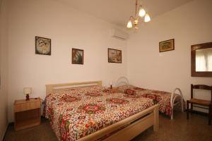 Voodi või voodid majutusasutuse Appartamento indipendente con giardino a 400 m dal mare toas