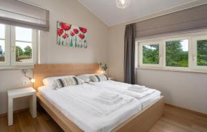 Postel nebo postele na pokoji v ubytování Villa Gemini