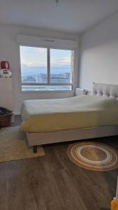 Ένα ή περισσότερα κρεβάτια σε δωμάτιο στο T3 cosy Bordeaux Paludate - Tram & Parking