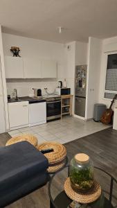 Η κουζίνα ή μικρή κουζίνα στο T3 cosy Bordeaux Paludate - Tram & Parking +5 φωτογραφίες