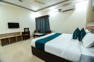 Ένα ή περισσότερα κρεβάτια σε δωμάτιο στο The Grand Palace In Clifton +7 φωτογραφίες