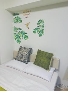 Postel nebo postele na pokoji v ubytování Shinjuku新宿公園