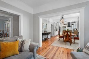 a living room with a table and a dining room at SaraCasa - First Floor House 2Br/1.5Bath in St. Augustine