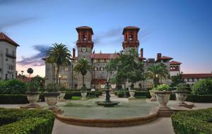 a courtyard with a fountain in front of a building at SaraCasa - First Floor House 2Br/1.5Bath in St. Augustine