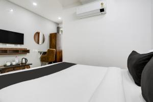 Et tv og/eller underholdning på Super Collection O De Alphabet Hotel