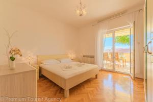 Postel nebo postele na pokoji v ubytování Sonja + 32 fotografií