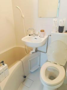 Koupelna v ubytování Shinjuku新宿公園