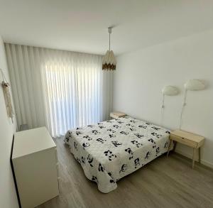 Giường trong phòng chung tại Imperial Beach House +11 ảnh