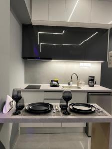 Dapur atau dapur kecil di Crystal Grey Elite Apartment 2 +18 gambar