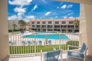 a view of a resort with a swimming pool at Pier Point South Ocean View Townhouse Condo B-20 in Saint Augustine Beach +15 photos
